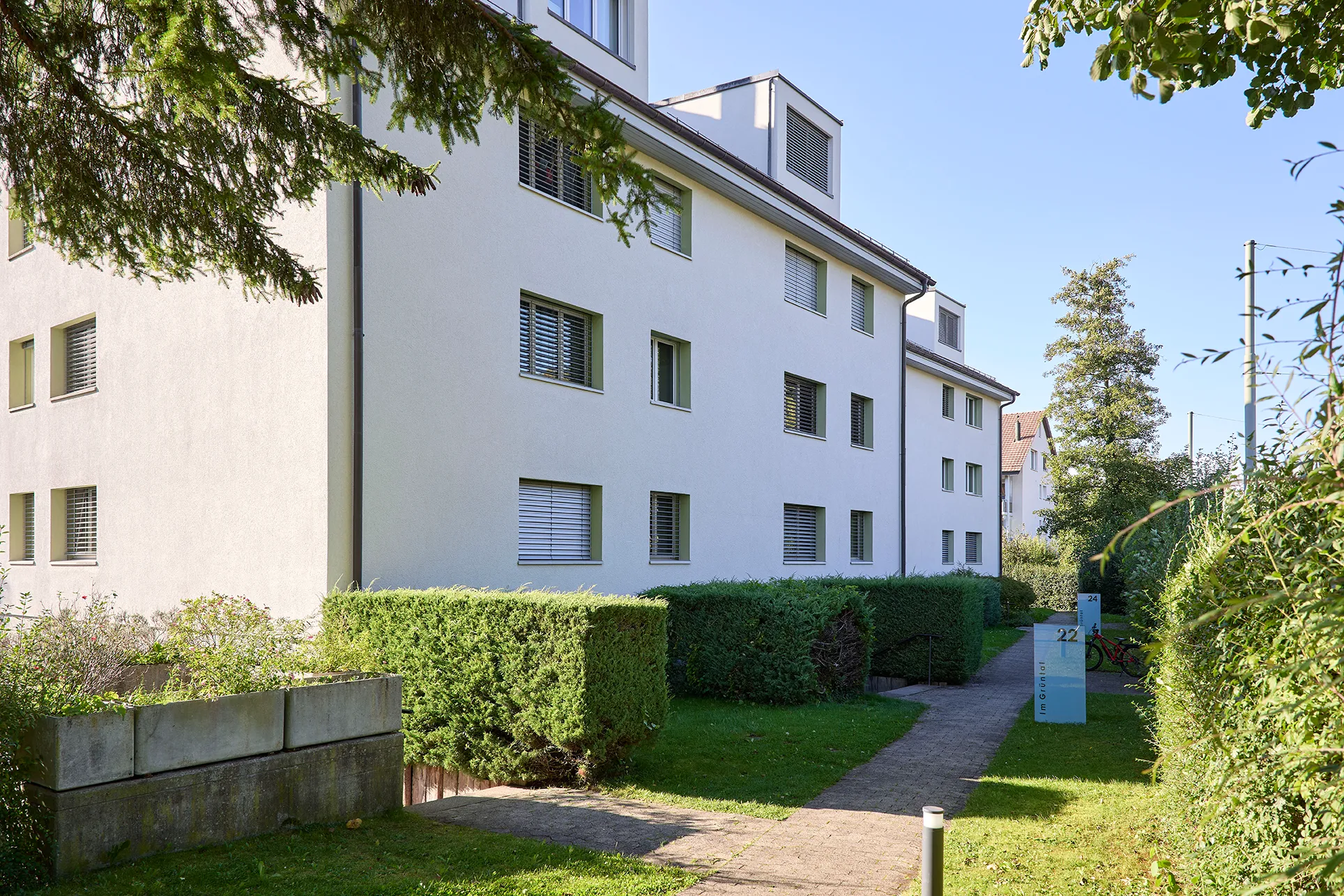 Zoom: wgw_wohnbau-genossenschaft_waldheim_winterthur_siedlung_im_gruntal_22-24_2.webp